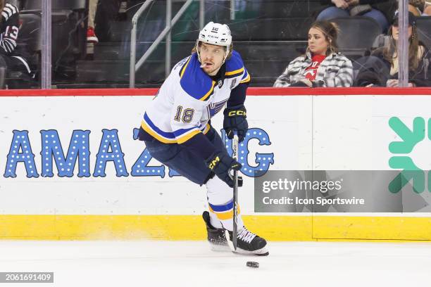 St. Louis Blues center Robert Thomas skates with the puck during a game between the St. Louis Blues and New Jersey Devils on March 7, 2024 at...