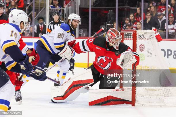 New Jersey Devils goaltender Nico Daws makes a save during a game between the St. Louis Blues and New Jersey Devils on March 7, 2024 at Prudential...