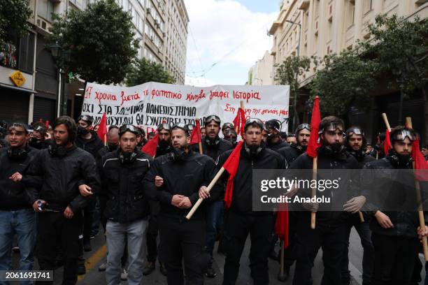 Student holding banners and flags take part in a protest against the government's new university reform in Athens, Greece on March 08, 2024.