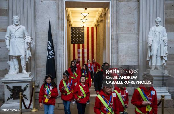 School tour group looks up at the rotunda in US Capitol in Washington, DC, on March 8, 2024. US senators were racing against the clock March 8 to...