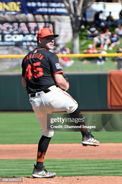 Kyle Harrison of the San Francisco Giants throws a pitch during the second inning of a spring training game against the Texas Rangers at Scottsdale...