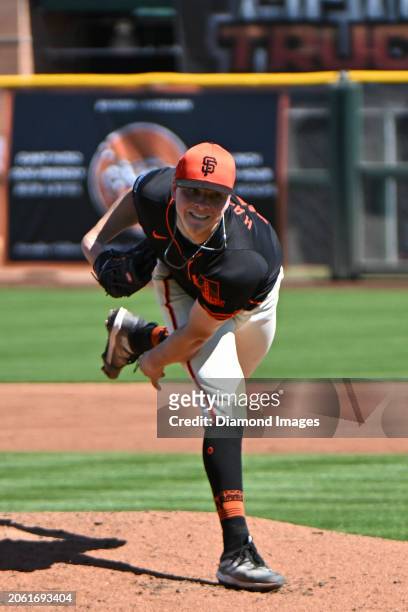 Kyle Harrison of the San Francisco Giants throws a pitch during the second inning of a spring training game against the Texas Rangers at Scottsdale...