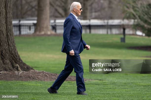 President Joe Biden walks to Marine One on the South Lawn of the White House in Washington, DC, on March 8, 2024. Biden is traveling to Philadelphia,...