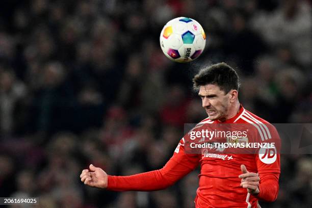Union Berlin's German defender Robin Gosens jumps for the ball during the German first division Bundesliga football match between VfB Stuttgart and 1...