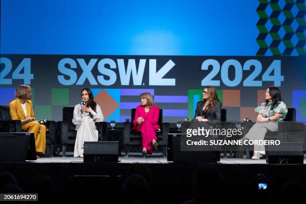 Moderator Errin Haines; Britain's Meghan, Duchess of Sussex; Journalist Katie Couric; actress Brooke Shields; and Sociologist Nancy Wang Yuen attend...