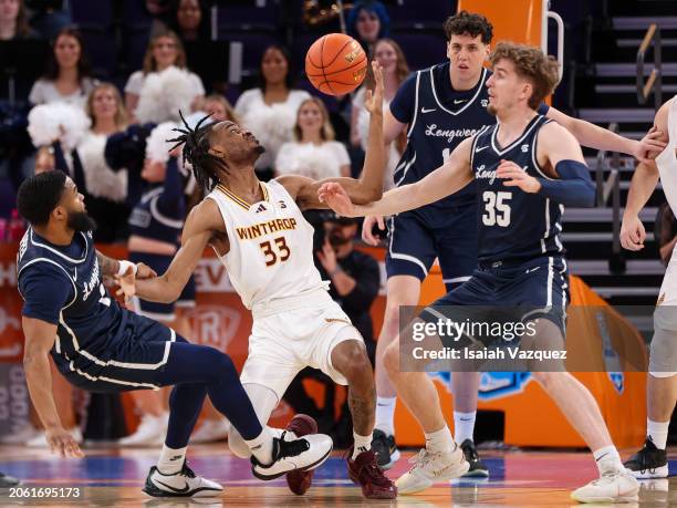 Chase Claxton of the Winthrop Eagles and Jesper Granlund of the Longwood Lancers scramble for the ball during the first half of the Quarterfinal of...