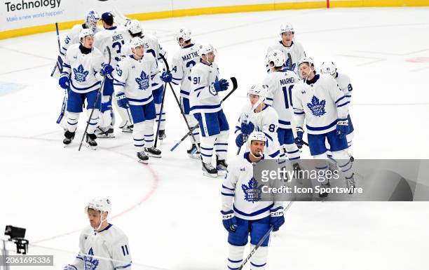 Toronto players celebrate after winning a NHL game between the Toronto Maple Leafs and the St. Louis Blues on February 19 at Enterprise Center in St....