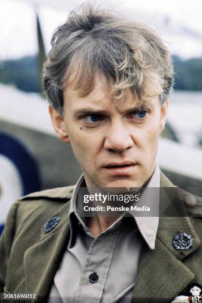 Actor Malcolm McDowell poses for portraits during an interview on the set of the film, "Aces High," in Wycombe Air Park on September 29, 1975 in...