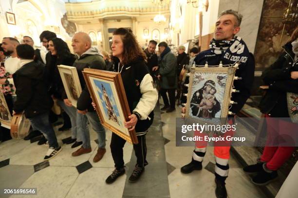 March 07 Pagani, Salerno, Italy: Worshippers gather for the blessing of paintings of the Madonna del Carmine, known as 'Madonna delle Galline' that...