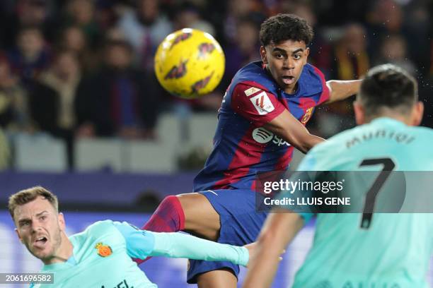 Barcelona's Spanish forward Lamine Yamal kicks the ball during the Spanish league football match between FC Barcelona and RCD Mallorca at the Estadi...