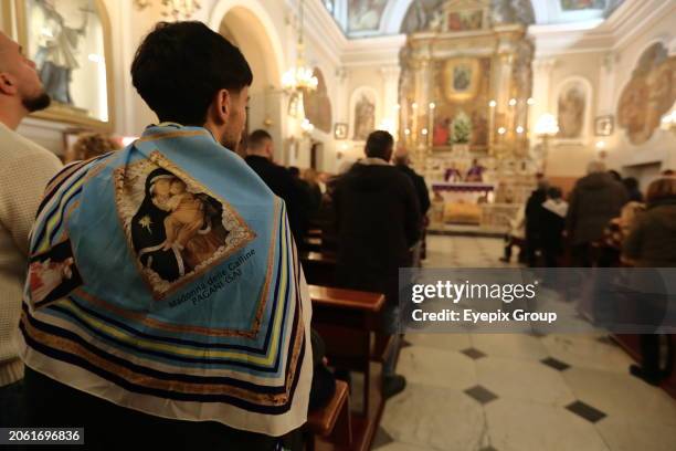 March 07 Pagani, Salerno, Italy: A worshipper wears a scarf depicting the image of the Madonna del Carmine, known as 'Madonna delle Galline' for the...