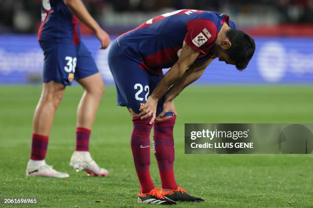 Barcelona's German midfielder Ilkay Gundogan reacts during the Spanish league football match between FC Barcelona and RCD Mallorca at the Estadi...