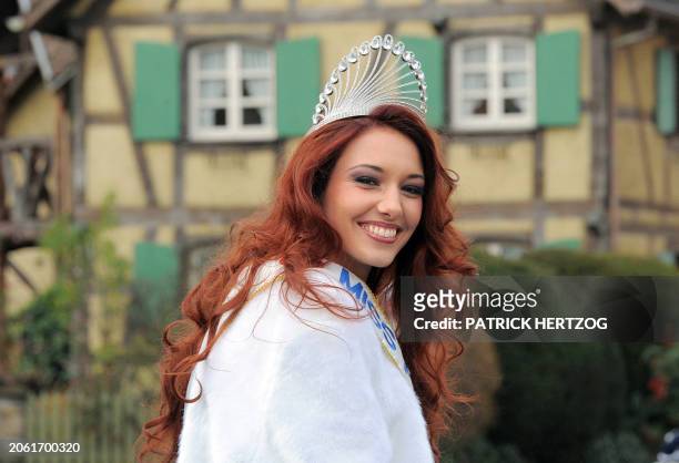 Newly crowned Miss France 2012, Delphine Wespiser waves as she arrives in her hometown in Magstatt-le-Bas, eastern France, on December 17, 2011. AFP...