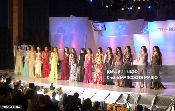 Miss Egypt 2004 contestants pose in front of the jury late 26 April 2004 in Cairo. AFP PHOTO/Marcoo DI MARIO