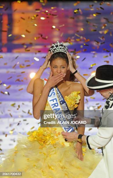 Miss Albigeois-Midi-Pyrénées Chloé Mortaud reacts while being crowned Miss France 2009 during the 62nd edition of the beauty contest in Le Puy-du...