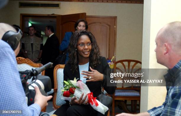 Miss America 2004 Ericka Dunlap is interviewed at her room in a five-star hotel in Kuwait City 24 November 2003. Dunlap's trip to spend Thanksgiving...