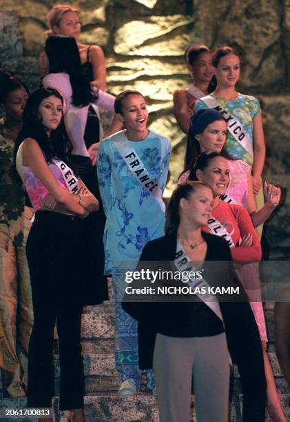 Miss France 2000 Sonia Rolland jokes with fellow contestants during a rehearsal for the Miss Universe 2000 pageant in Nicosia 08 May 2000. Some 79...