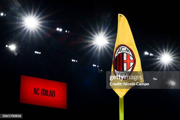 General view of Giuseppe Meazza stadium shows a corner flag bearing the logo of AC Milan as a scoreboard displays the write 'AC Milan' prior to the...