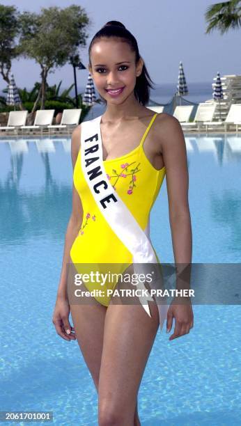 Sonia Rolland, Miss France 2000, poses during a swimwear photo-shoot at a five-star hotel in Limassol 26 April 2000 for a Miss Universe swimsuit...