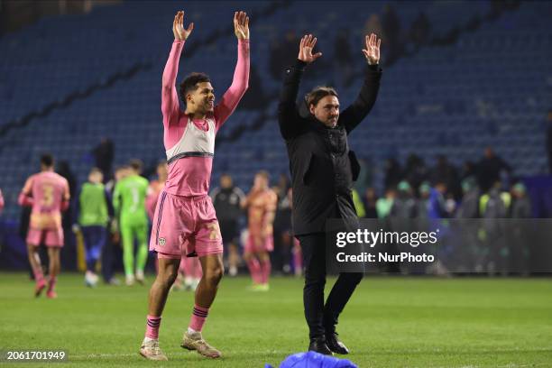 Georginio Rutter of Leeds United is serenading the fans alongside Daniel Farke, the Leeds United manager, after the Sky Bet Championship match...