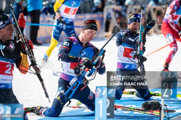 France's Fabien Claude prepares to shoot during the men's 4x7.5-km relay of the IBU Biathlon World Cup at Soldier Hollow Nordic Center in Midway,...
