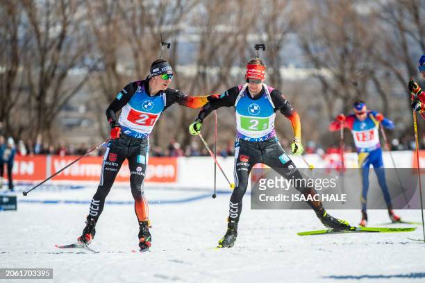 Germany's Justus Strelow tags his teammate Johannes Kuehn during the men's 4x7.5-km relay of the IBU Biathlon World Cup at Soldier Hollow Nordic...