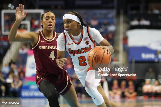 Syracuse Orange guard Dyaisha Fair drives past Florida State Seminoles guard Sara Bejedi during the college basketball game at the ACC Tournament on...