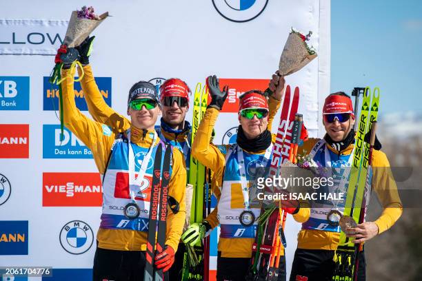 Germany's Justus Strelow, Johannes Kuehn, Benedikt Doll and Philipp Nawrath celebrate their team's third-place finish in the men's 4x7.5-km relay of...