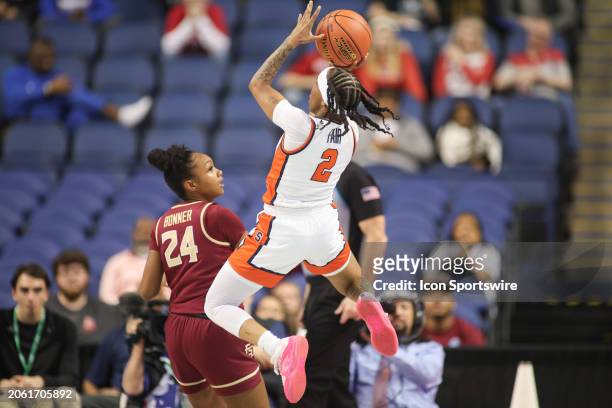 Syracuse Orange guard Dyaisha Fair shoots over Florida State Seminoles guard Amaya Bonner during the college basketball game at the ACC Tournament on...