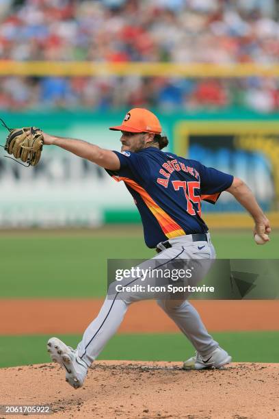 Houston Astros pitcher Spencer Arrighetti delivers a pitch to the plate during the spring training game between the Houston Astros and the...