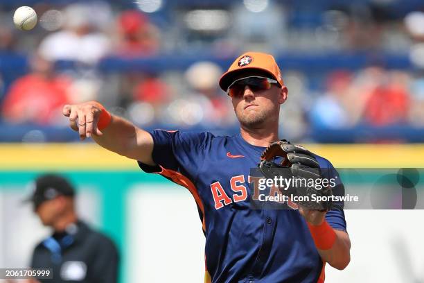 Houston Astros infielder Grae Kessinger throws the ball over to first base during the spring training game between the Houston Astros and the...