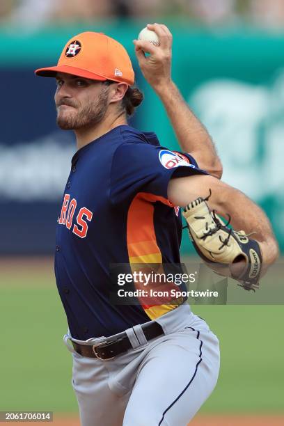 Houston Astros pitcher Spencer Arrighetti delivers a pitch to the plate during the spring training game between the Houston Astros and the...