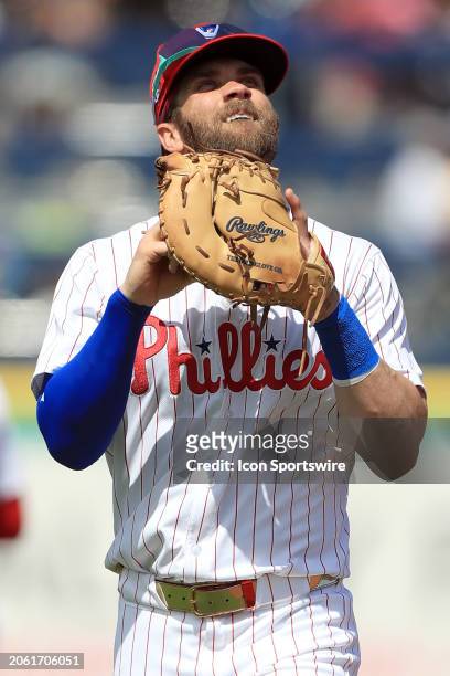 Philadelphia Phillies first baseman Bryce Harper looks skyward during the spring training game between the Houston Astros and the Philadelphia...