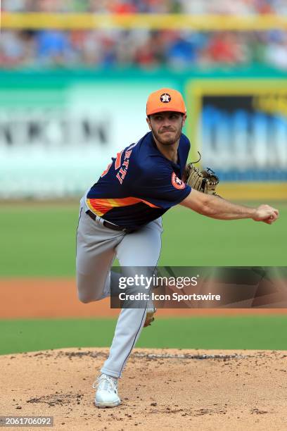 Houston Astros pitcher Spencer Arrighetti delivers a pitch to the plate during the spring training game between the Houston Astros and the...