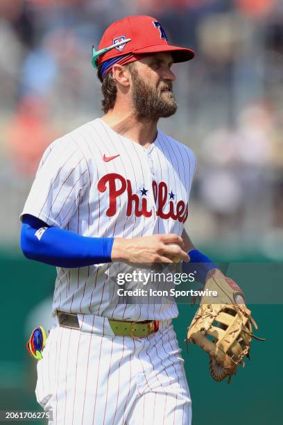 Philadelphia Phillies first baseman Bryce Harper glares towards the outfield stands during the spring training game between the Houston Astros and...