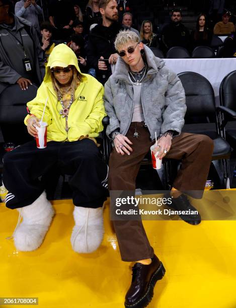 Machine Gun Kelly and Trippie Redd attend the game between Los Angeles Lakers and Milwaukee Bucks at Crypto.com Arena on March 8, 2024 in Los...