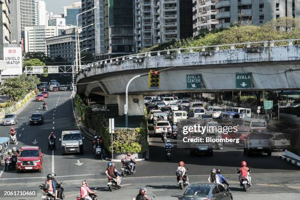 Motorists pass through Ayala Center in the central business district in Makati City, Metro Manila, the Philippines, on Thursday, March 7, 2024. Ayala...
