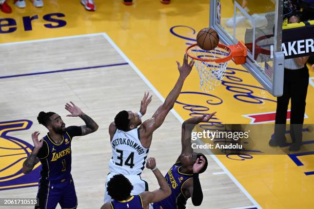 Giannis Antetokounmpo of Milwaukee Bucks in action against D'Angelo Russell , Rui Hachimura of Los Angeles Lakers during NBA game between Milwaukee...