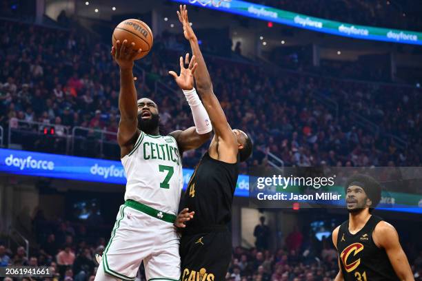 Jaylen Brown of the Boston Celtics goes to basket against Evan Mobley of the Cleveland Cavaliers during the first quarter at Rocket Mortgage...