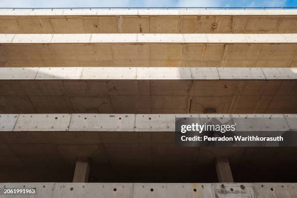 the raw texture of concrete with visible formwork patterns, holes, and weathering. - robust ghost pipefish stock pictures, royalty-free photos & images