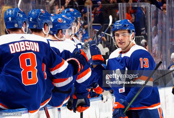 Mathew Barzal of the New York Islanders celebrates his empty net goal against the St. Louis Blues at UBS Arena on March 05, 2024 in Elmont, New York....
