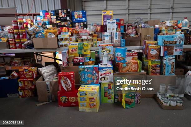 Volunteers distribute food and other household items to victims of the Smokehouse Creek fire on March 05, 2024 in Canadian, Texas. The fire has...