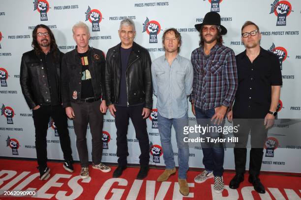 Dave Grohl, Josh Freese, Pat Smear, Chris Shiflett, Rami Jaffee, and Nate Mendel of Foo Fighters attend the Power to the Patients Foo Fighters...