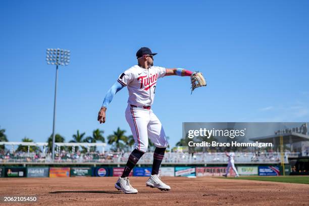 Royce Lewis of the Minnesota Twins throws during a spring training game against the Pittsburgh Pirates on February 24, 2024 at the Lee County Sports...