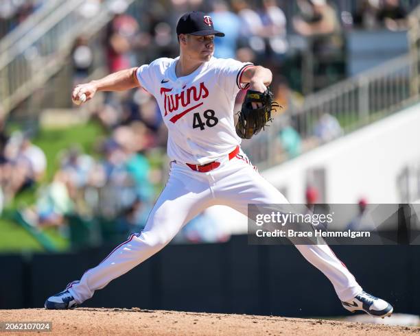 Justin Topa of the Minnesota Twins pitches during a spring training game against the Pittsburgh Pirates on February 24, 2024 at the Lee County Sports...