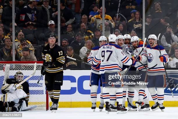 Leon Draisaitl of the Edmonton Oilers celebrates with Connor McDavid, Ryan Nugent-Hopkins, Evan Bouchard, and Evander Kane after scoring against...