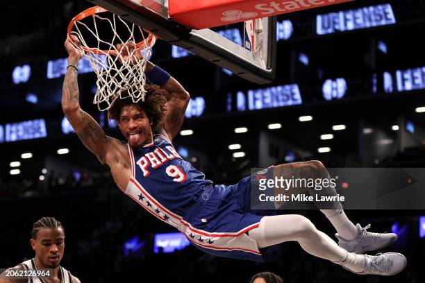 Kelly Oubre Jr. #9 of the Philadelphia 76ers reacts after a dunk in the third quarter against the Brooklyn Nets at Barclays Center on March 05, 2024...