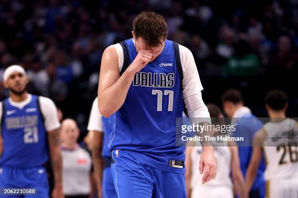 Luka Doncic of the Dallas Mavericks reacts after a play in the second half against the Indiana Pacers at American Airlines Center on March 05, 2024...