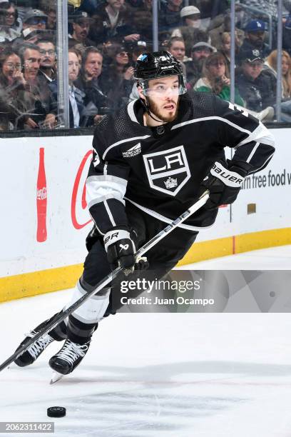 Matt Roy of the Los Angeles Kings skates with the puck during the second period against the Vancouver Canucks at Crypto.com Arena on March 5, 2024 in...