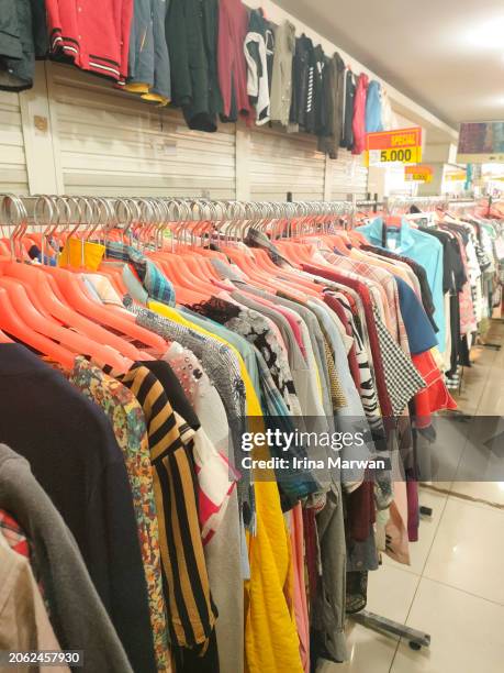 clothes at thrift store - thrift stock pictures, royalty-free photos & images